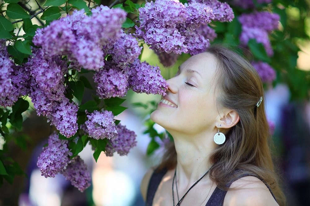smelling flowers